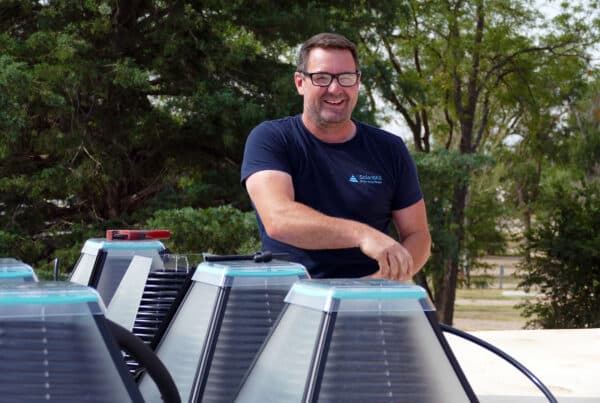 Kris Aitchison installing SolarisKit solar collectors